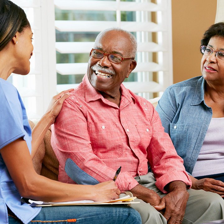 Elderly patient undergoing oral cancer examination in Stafford, VA