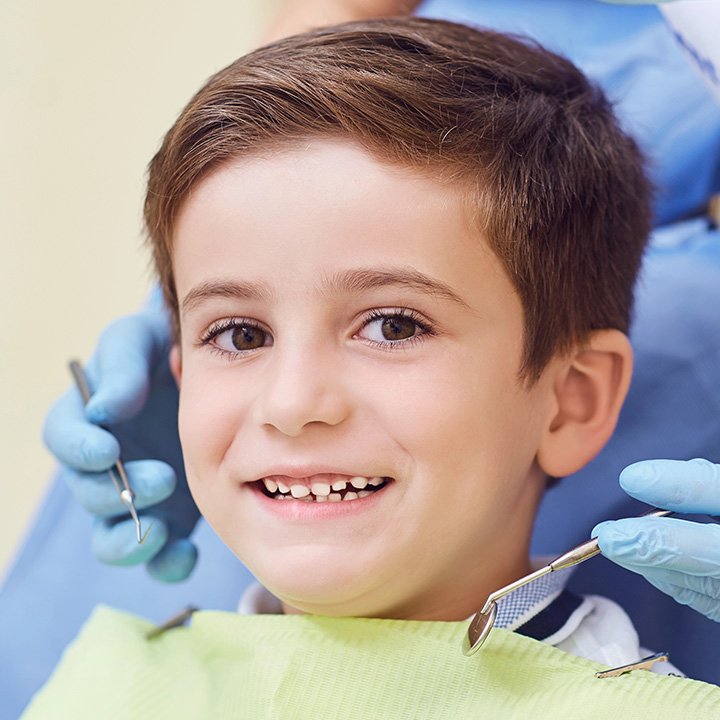 Happy child after receiving pediatric dentistry care in Stafford, VA