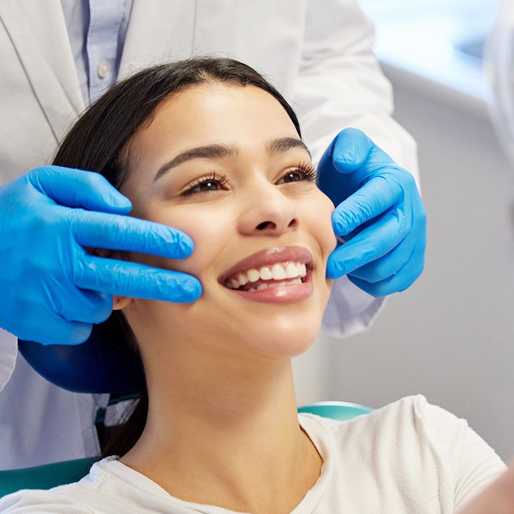 Happy woman after receiving dental fillings treatment in Stafford, VA